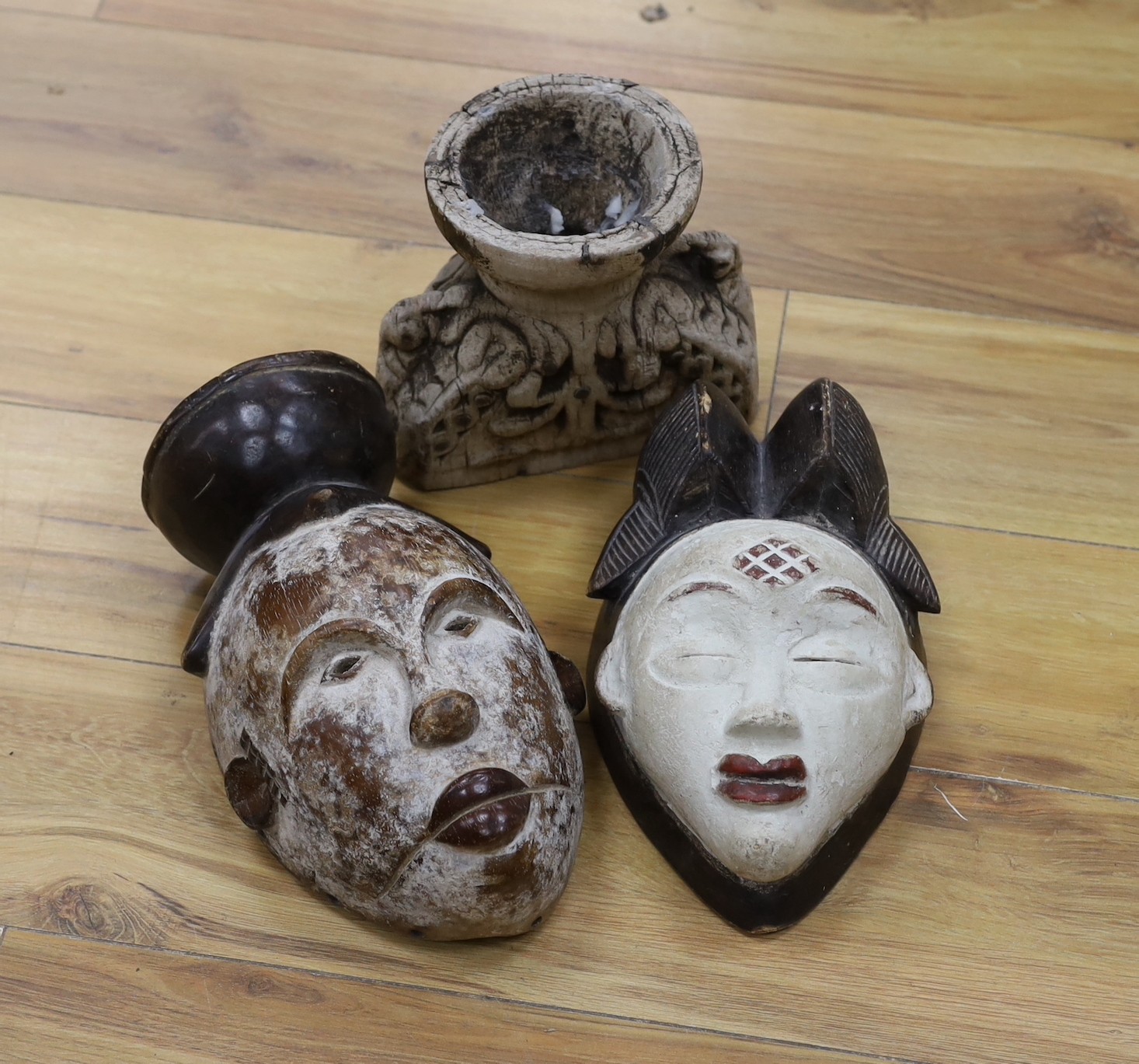 The Two African masks and another carving, tallest mask 30cm high